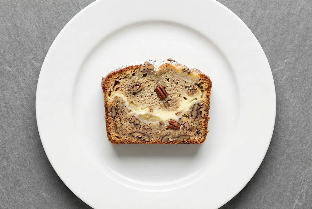 Elevated banana bread featuring the crémage technique for superior texture and rich, balanced flavor.